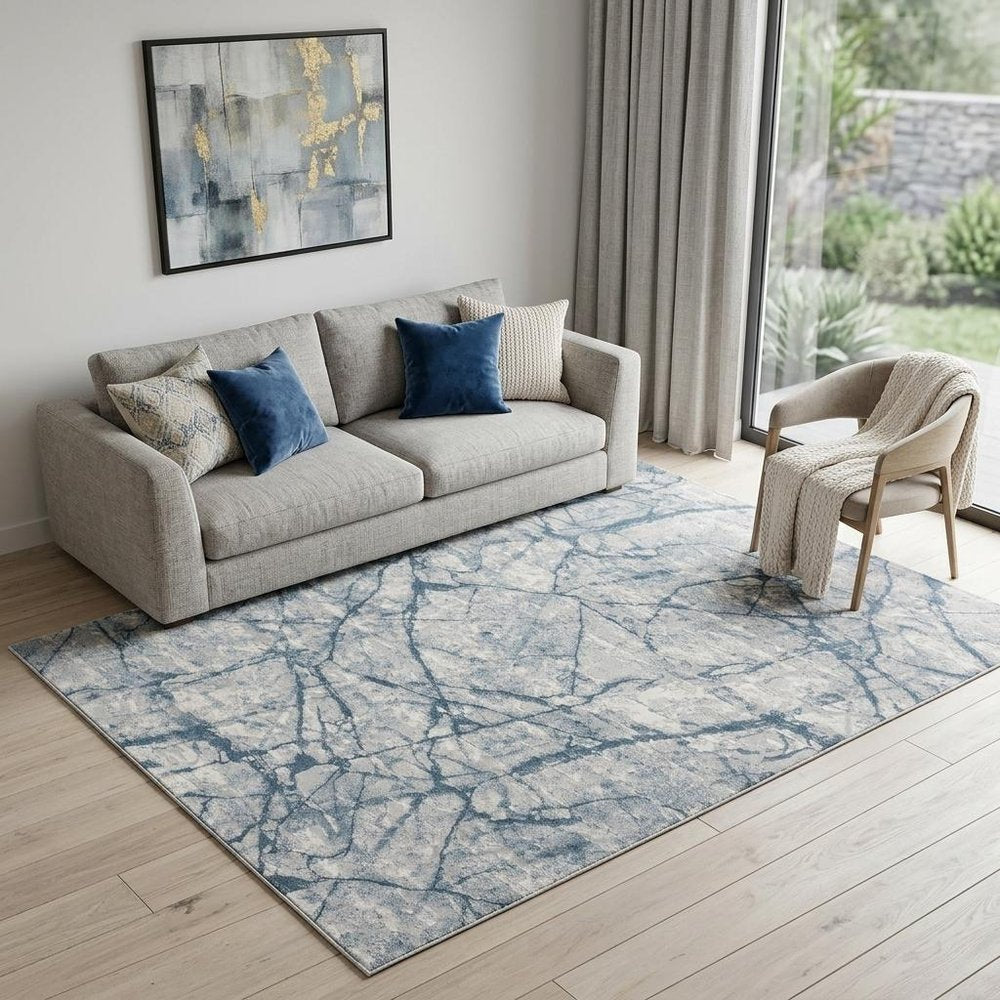 10' X 13' Blue Gray And Ivory Abstract Distressed Stain Resistant Area Rug