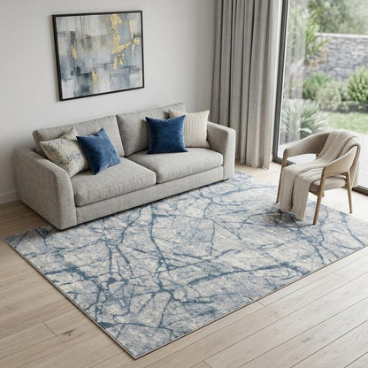 10' X 13' Blue Gray And Ivory Abstract Distressed Stain Resistant Area Rug