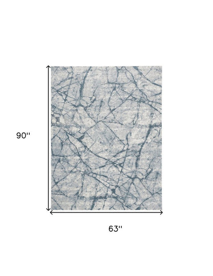 10' X 13' Blue Gray And Ivory Abstract Distressed Stain Resistant Area Rug