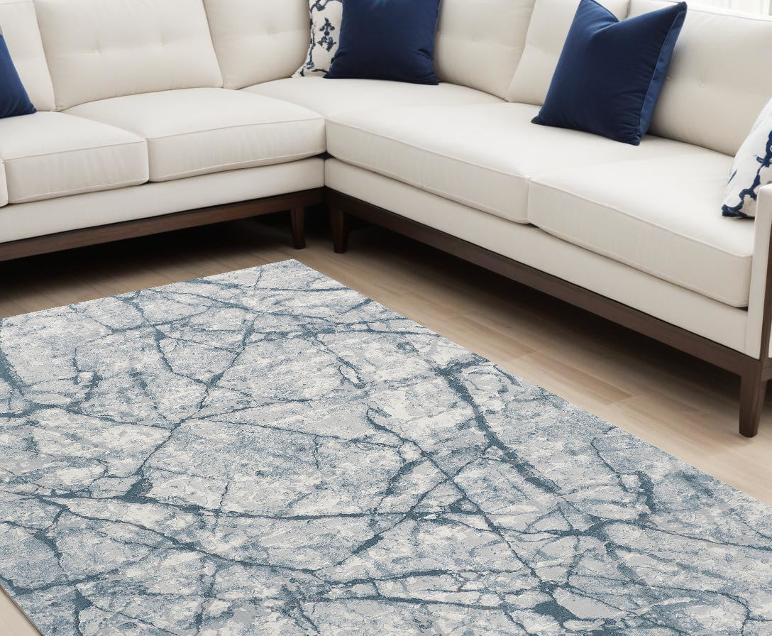 3' X 5' Blue Gray And Ivory Abstract Distressed Stain Resistant Area Rug