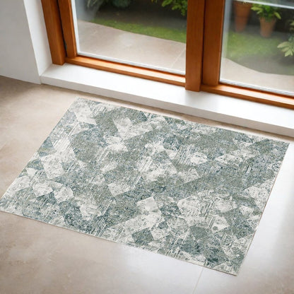 2' X 3' Green And Ivory Patchwork Distressed Stain Resistant Area Rug