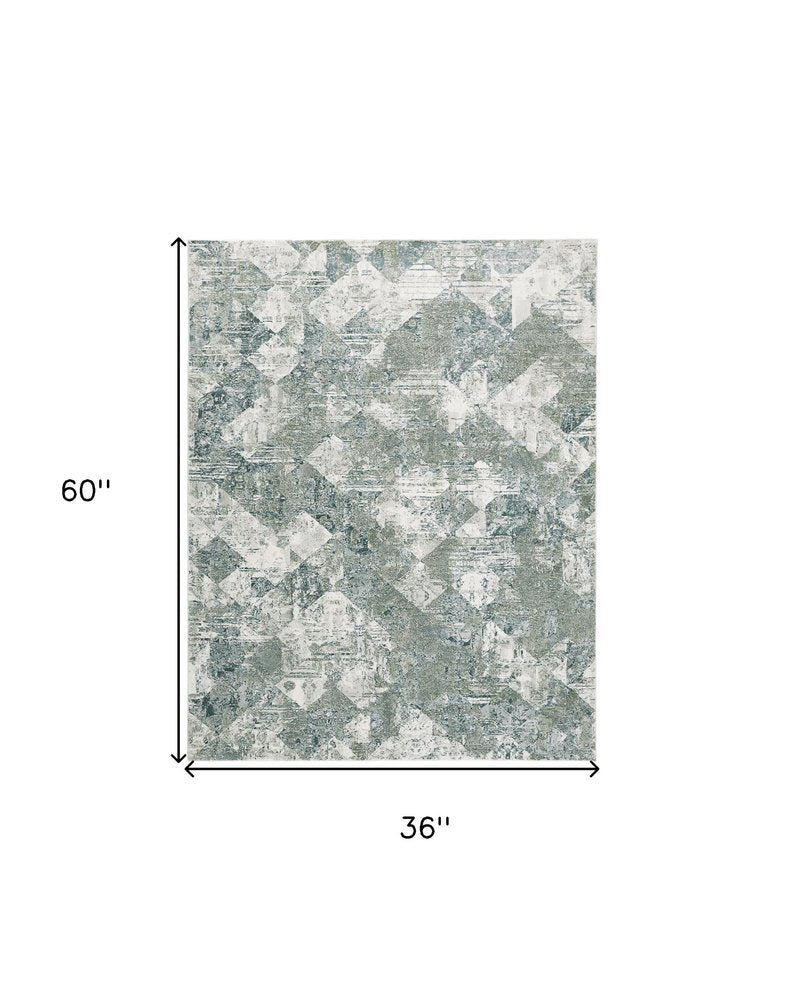 2' X 3' Green And Ivory Patchwork Distressed Stain Resistant Area Rug