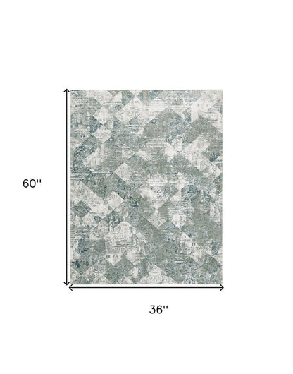 2' X 3' Green And Ivory Patchwork Distressed Stain Resistant Area Rug