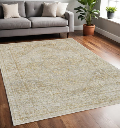 4' X 6' Gold And Ivory Floral Medallion Area Rug