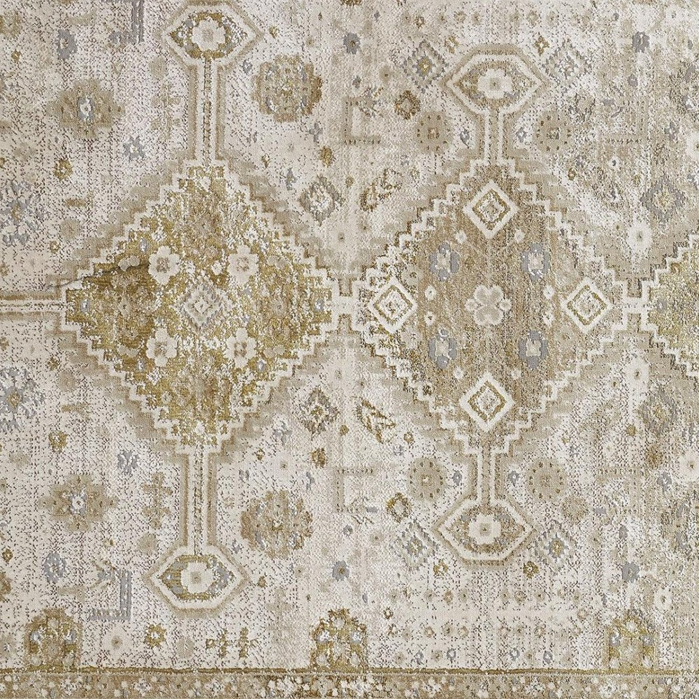 7' X 10' Gold And Ivory Floral Stain Resistant Area Rug