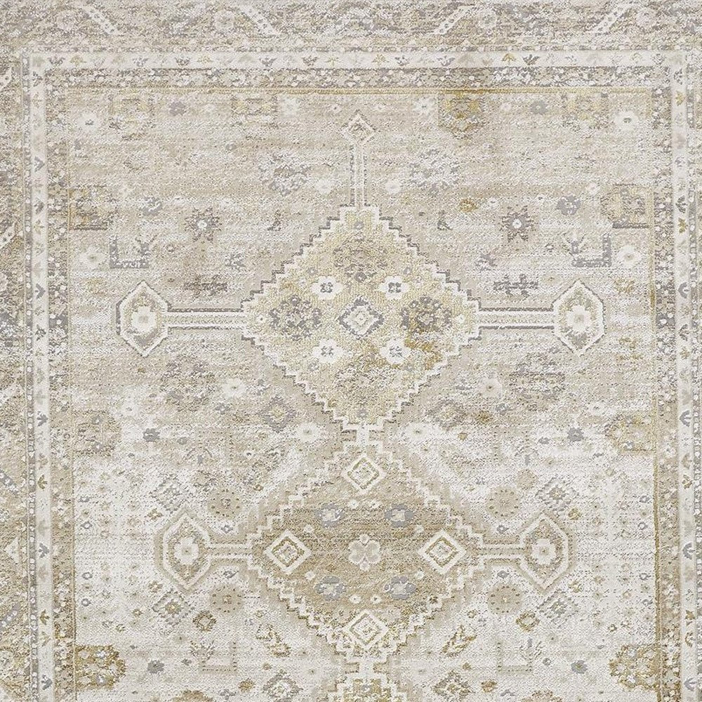 7' X 10' Gold And Ivory Floral Stain Resistant Area Rug