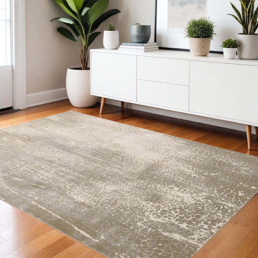 4' X 6' Gold Gray And Ivory Abstract Area Rug