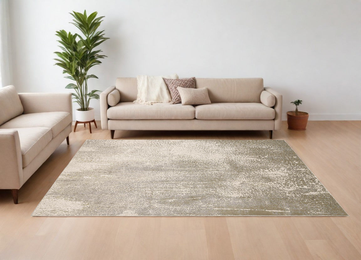 4' X 6' Ivory Gray And Gold Abstract Area Rug