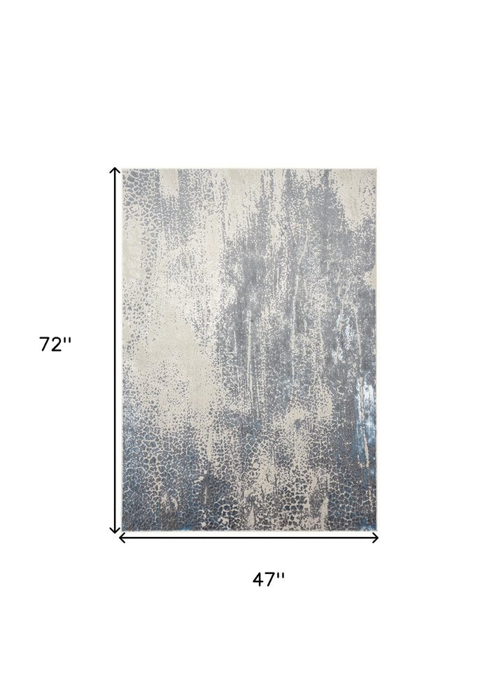 4' X 6' Ivory Gray And Blue Abstract Area Rug