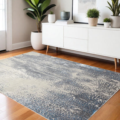 4' X 6' Ivory Gray And Blue Abstract Area Rug