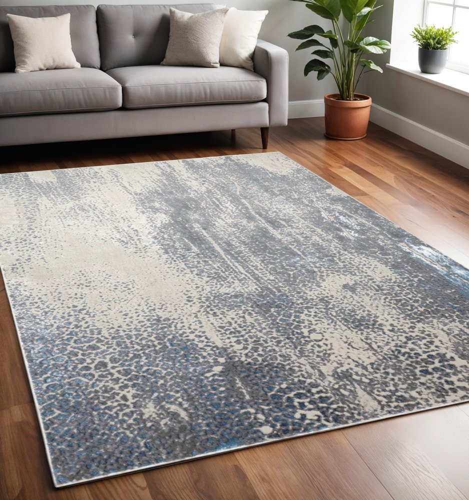 4' X 6' Ivory Gray And Blue Abstract Area Rug
