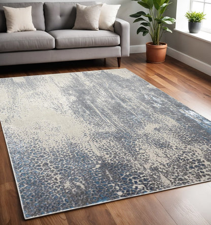 4' X 6' Ivory Gray And Blue Abstract Area Rug