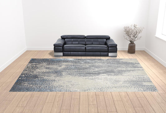 4' X 6' Gray Blue And Ivory Abstract Area Rug