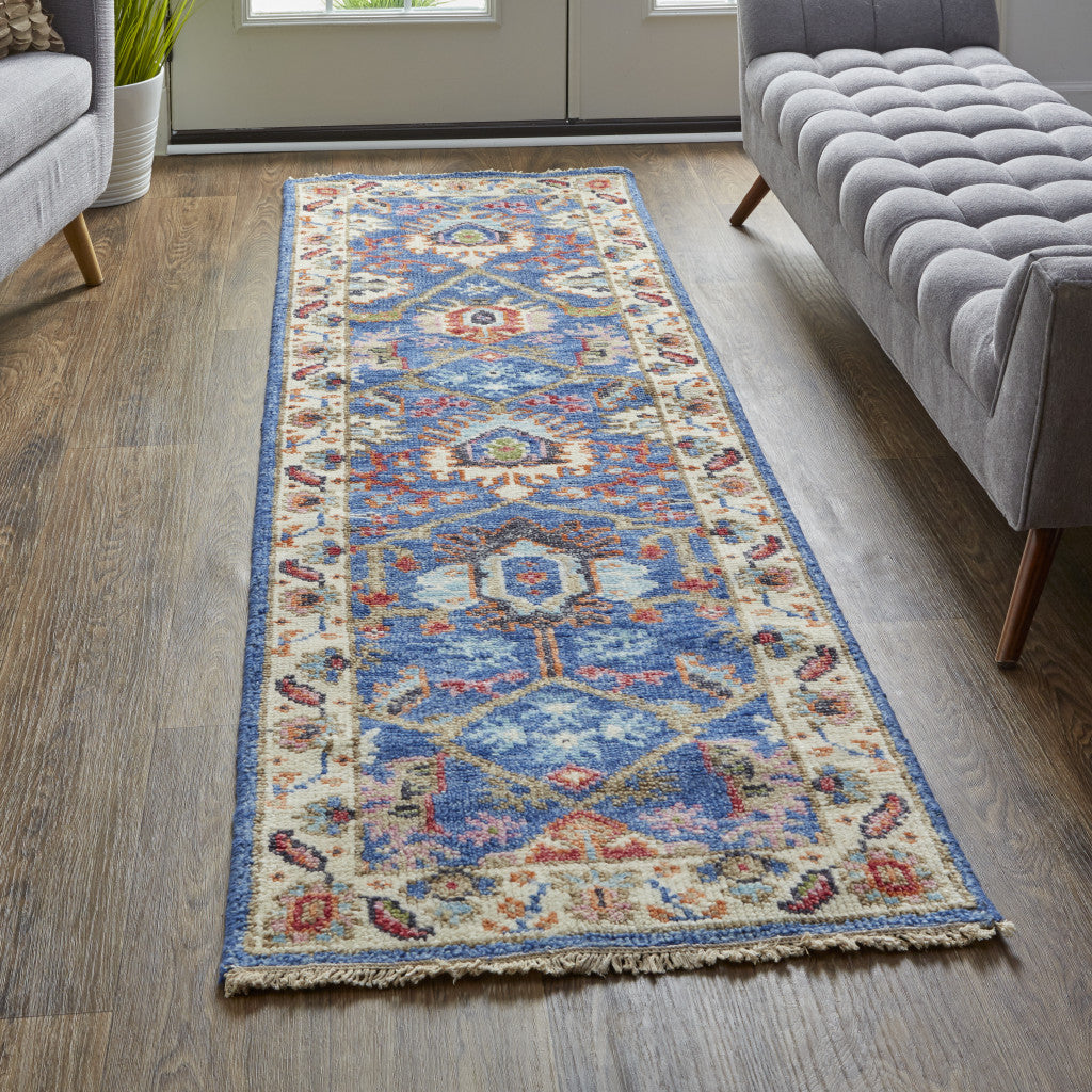 8' X 10' Blue And Red Wool Floral Hand Knotted Stain Resistant Area Rug