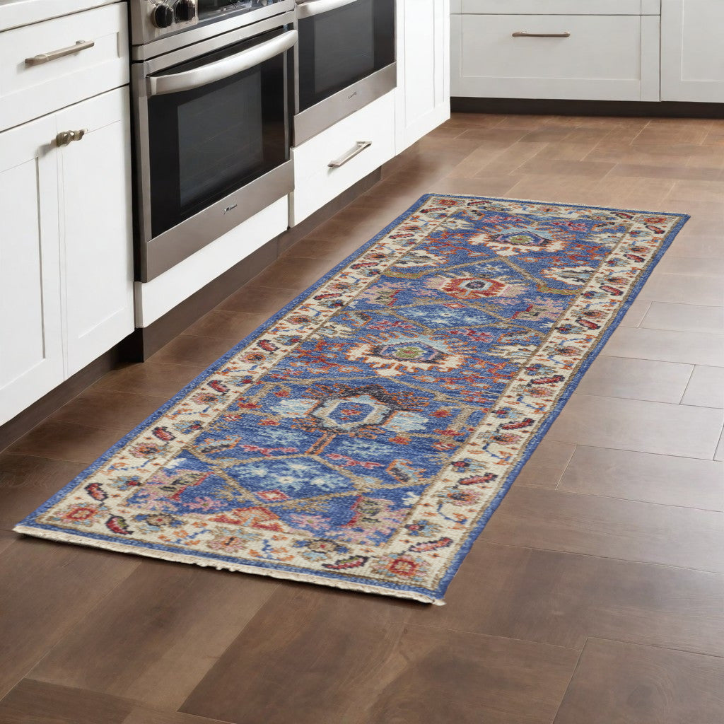 8' X 10' Blue And Red Wool Floral Hand Knotted Stain Resistant Area Rug