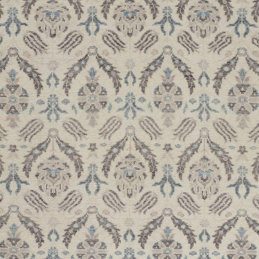 8' X 10' Ivory Gray And Blue Wool Floral Hand Knotted Stain Resistant Area Rug