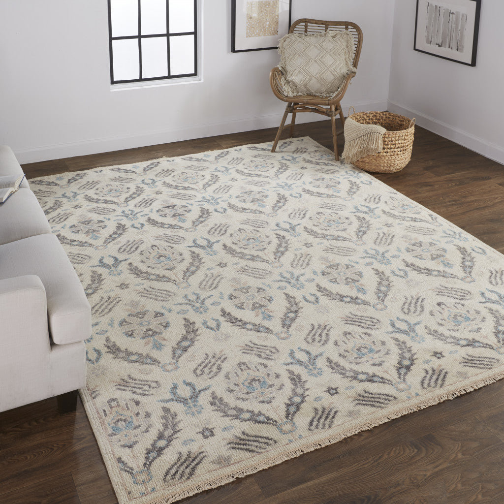 8' X 10' Ivory Gray And Blue Wool Floral Hand Knotted Stain Resistant Area Rug