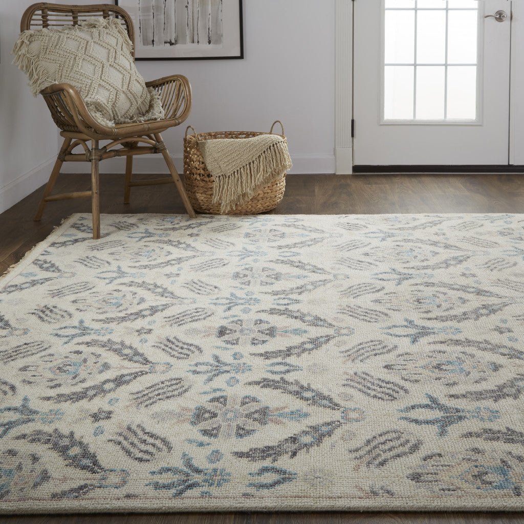 4' X 6' Gray and Ivory Wool Floral Hand Knotted Area Rug