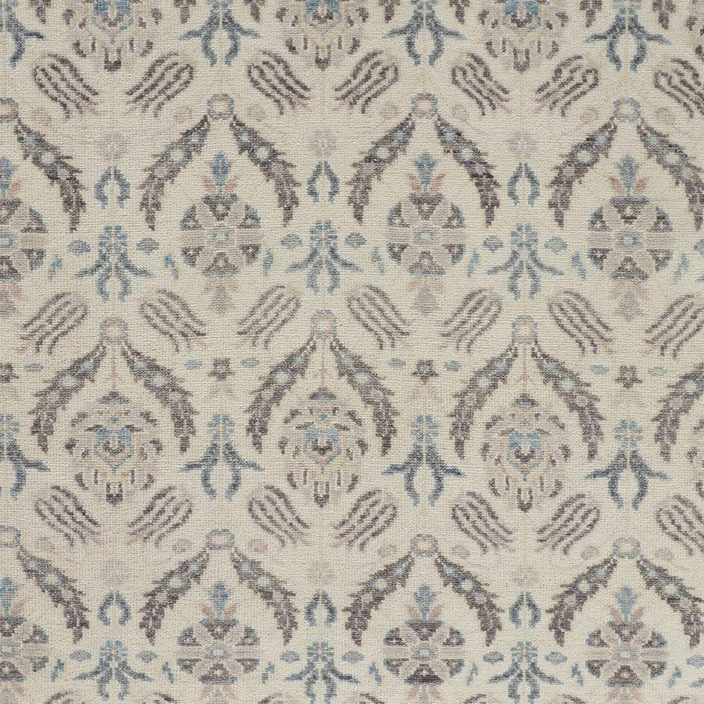8' X 10' Ivory Gray And Blue Wool Floral Hand Knotted Stain Resistant Area Rug