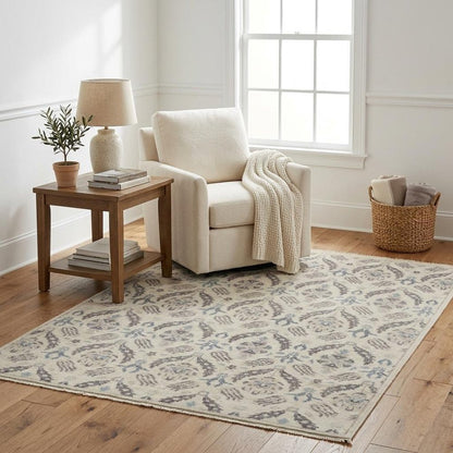 5' X 8' Gray and Ivory Wool Floral Hand Knotted Area Rug