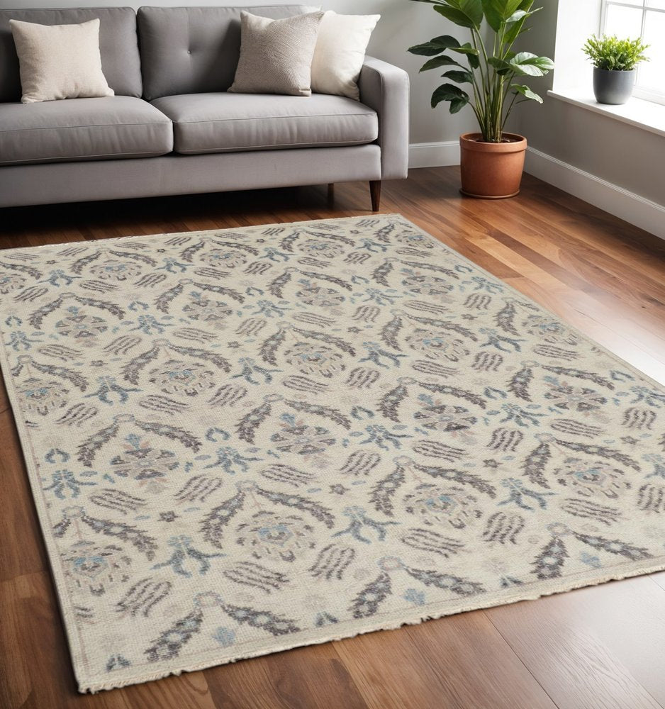8' X 10' Ivory Gray And Blue Wool Floral Hand Knotted Stain Resistant Area Rug