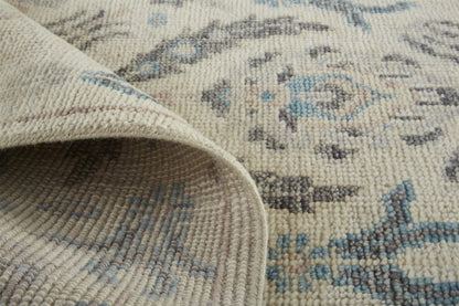 5' X 8' Gray and Ivory Wool Floral Hand Knotted Area Rug