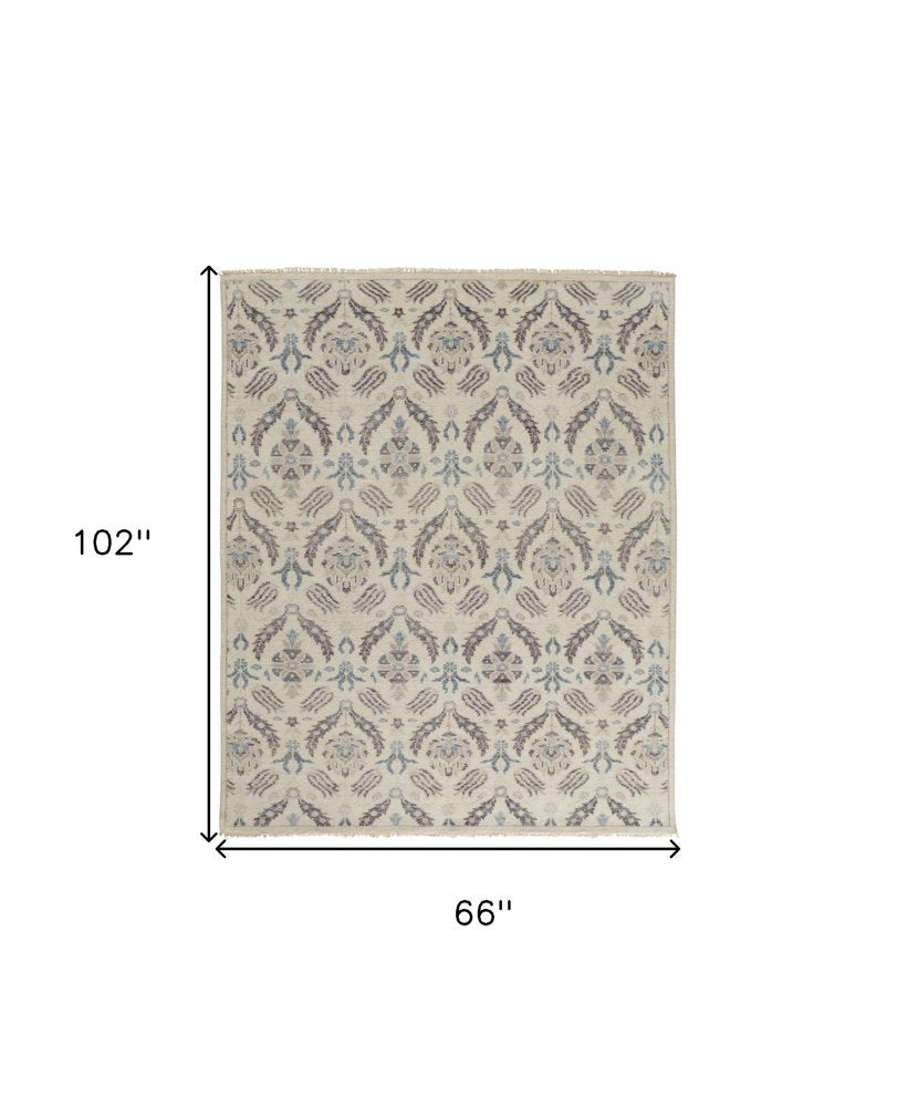 8' X 10' Ivory Gray And Blue Wool Floral Hand Knotted Stain Resistant Area Rug