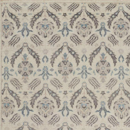 5' X 8' Gray and Ivory Wool Floral Hand Knotted Area Rug