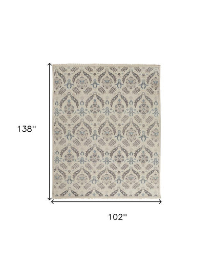 8' X 10' Ivory Gray And Blue Wool Floral Hand Knotted Stain Resistant Area Rug