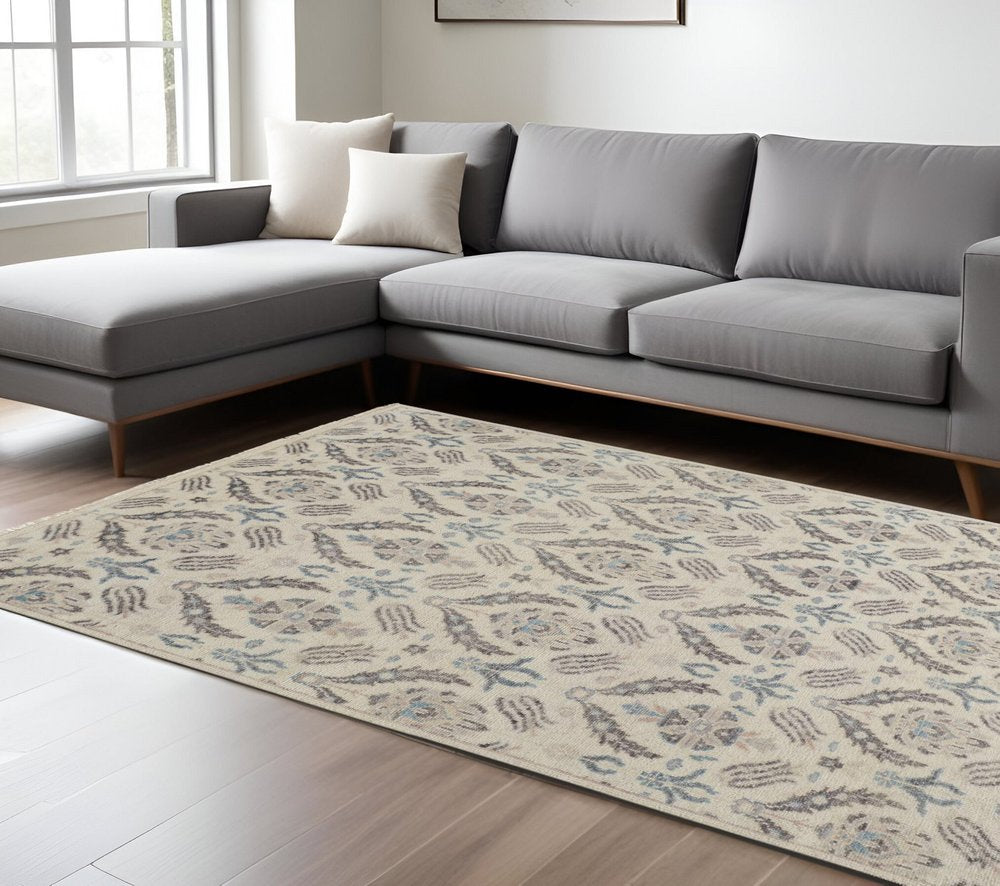 8' X 10' Ivory Gray And Blue Wool Floral Hand Knotted Stain Resistant Area Rug