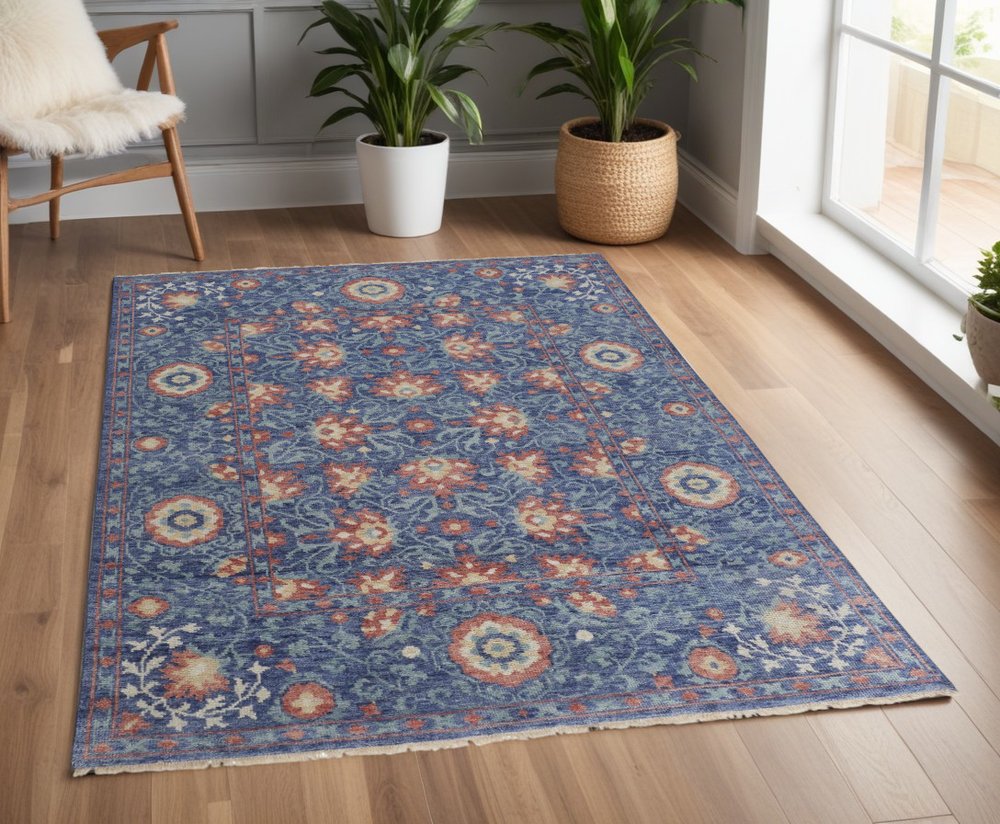 4' X 6' Blue and Beige Wool Floral Hand Knotted Area Rug