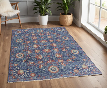 4' X 6' Blue and Beige Wool Floral Hand Knotted Area Rug