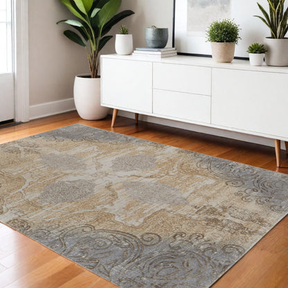 4' X 6' Tan And Gray Medallion Area Rug