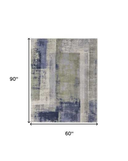 4' X 6' Blue Green And Ivory Abstract Distressed Area Rug