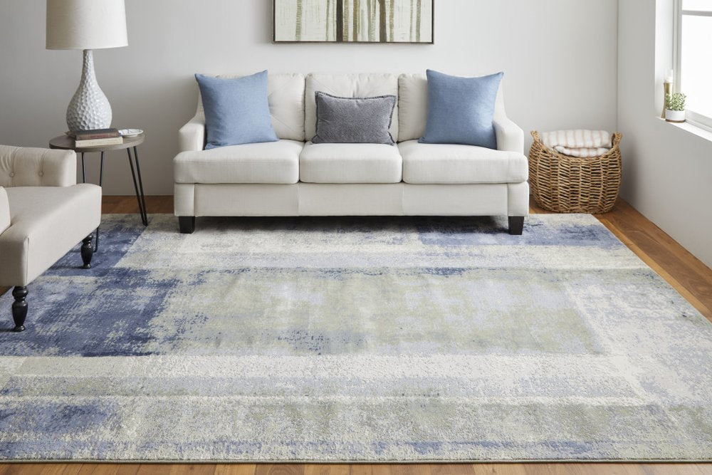 4' X 6' Blue Green And Ivory Abstract Distressed Area Rug