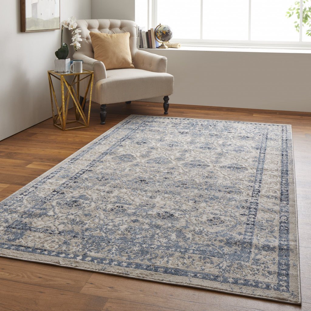 8' X 10' Blue And Ivory Geometric Power Loom Distressed Area Rug