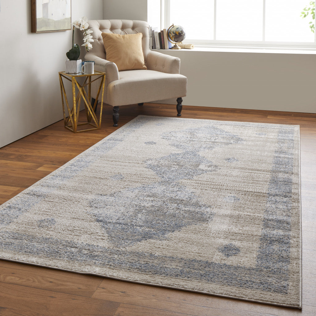 8' X 10' Blue And Ivory Geometric Power Loom Distressed Area Rug