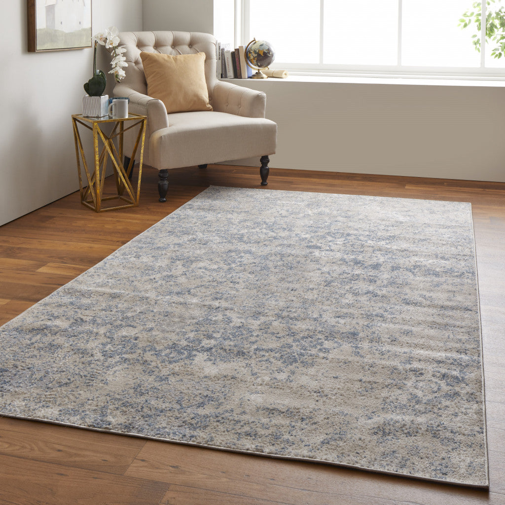 8' X 10' Blue And Ivory Abstract Power Loom Distressed Area Rug