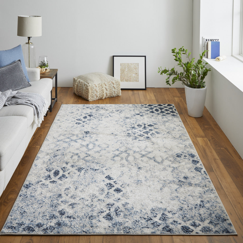 8' X 10' Ivory And Blue Abstract Power Loom Distressed Area Rug