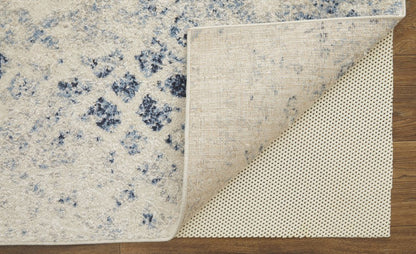 7' X 10' Ivory And Blue Abstract Power Loom Distressed Area Rug