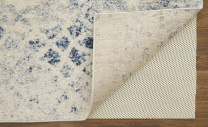 7' X 10' Ivory And Blue Abstract Power Loom Distressed Area Rug