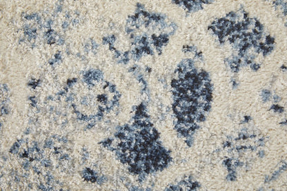 7' X 10' Ivory And Blue Abstract Power Loom Distressed Area Rug