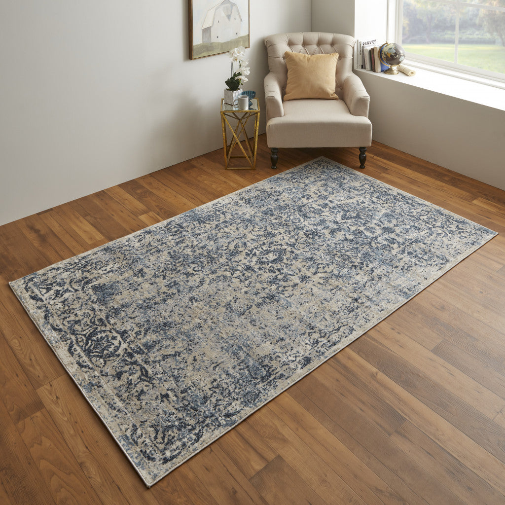 8' X 10' Blue And Ivory Floral Power Loom Distressed Area Rug