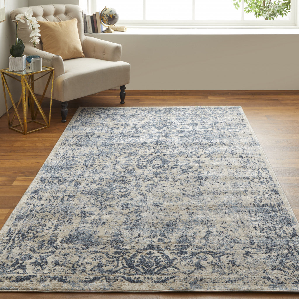 8' X 10' Blue And Ivory Floral Power Loom Distressed Area Rug