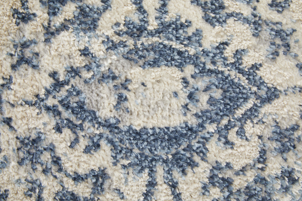 8' X 10' Blue And Ivory Floral Power Loom Distressed Area Rug