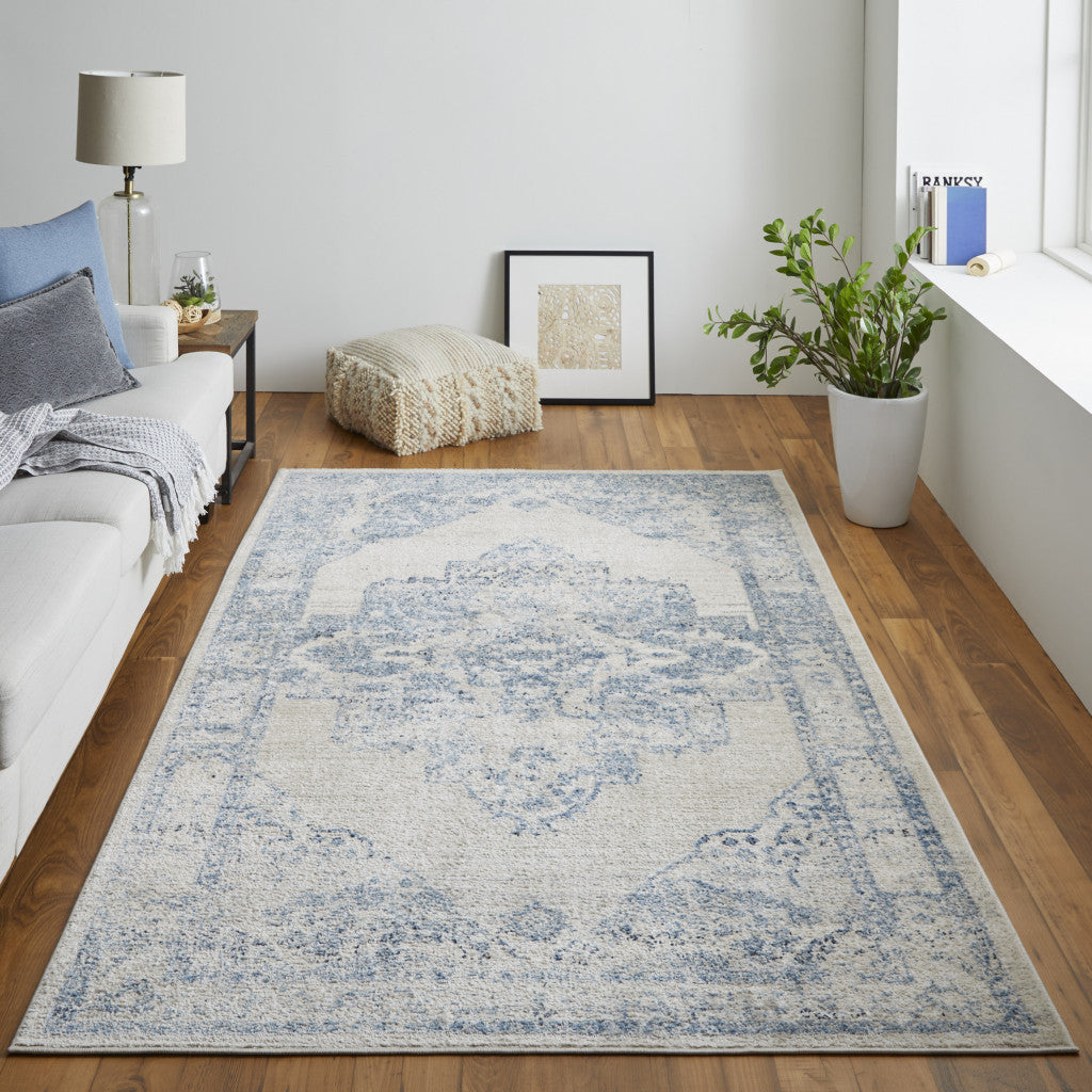 8' X 10' Blue And Ivory Floral Power Loom Distressed Area Rug