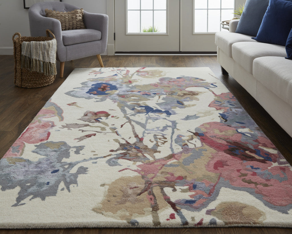 8' X 10' Ivory and Blue Wool Floral Hand Tufted Area Rug