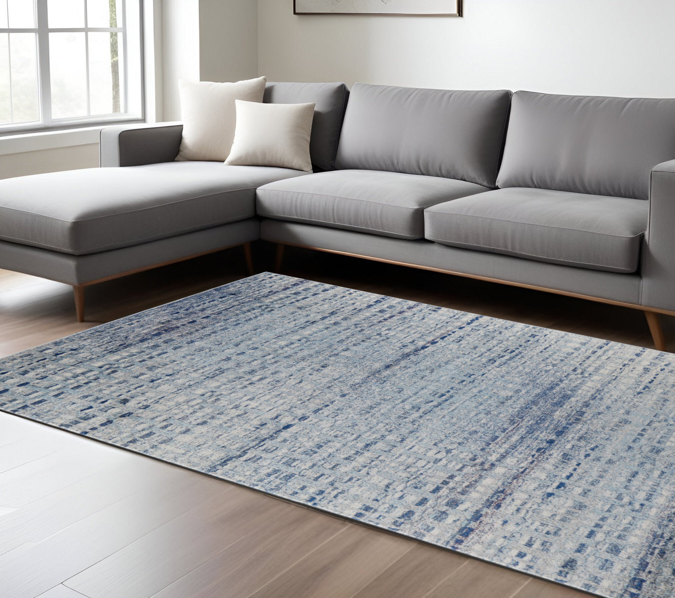 3' X 5' Blue And Ivory Abstract Power Loom Stain Resistant Area Rug