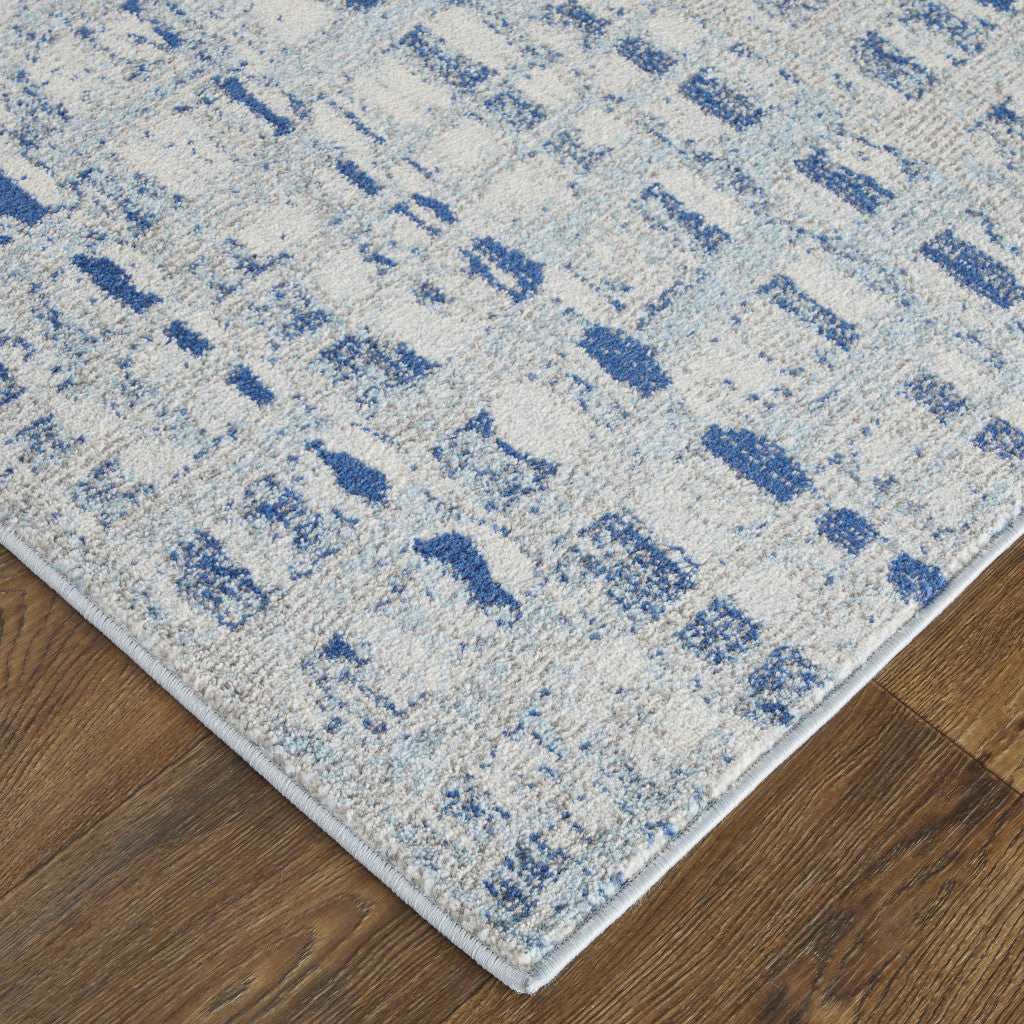 3' X 5' Blue And Ivory Abstract Power Loom Stain Resistant Area Rug