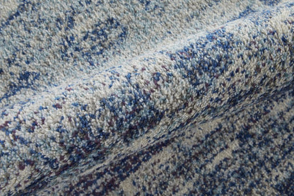 10' X 14' Blue And Ivory Abstract Power Loom Stain Resistant Area Rug